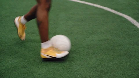 Close Tracking of Black Athlete Running with Ball During Practice Stock-Footage 306825496