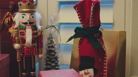 Close-up tracking shot across Christmas ornaments Stock Footage 127069042
