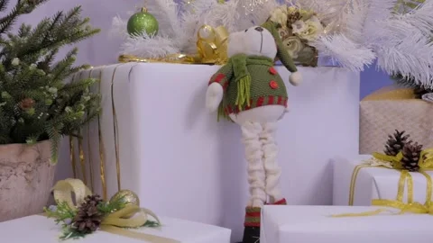 Close-up tracking shot of beautiful presents under the Christmas tree. Stock Footage 103326682