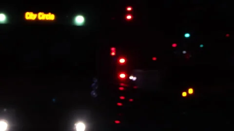 Close up tracking shot of train entering city circle with electronic display 스톡 동영상 332911712