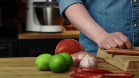 Close up tracking video of tossing leek in the kitchen 스톡 동영상 131589113