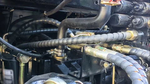 Close up of tractor hydraulic hoses. Video stock 317676823