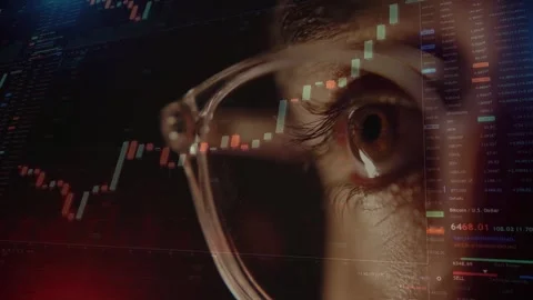 Close Up of Trader Eye Behind Glasses with Bitcoin Candlestick Chart Overlay Stockbeeldmateriaal 336011803