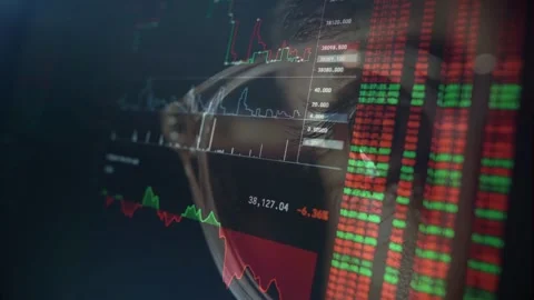 Close Up of Trader Eye in Glasses Reflecting Stock Market Crash and Order Book 動画素材 336011806