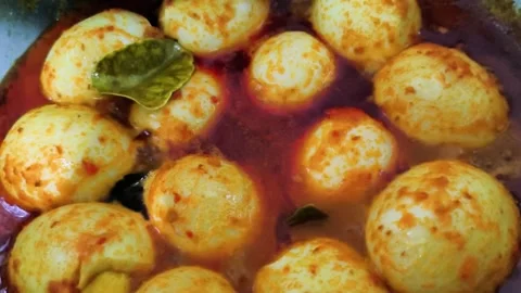 Close up of traditional Asian egg dish cooking process Stock Footage 334515619