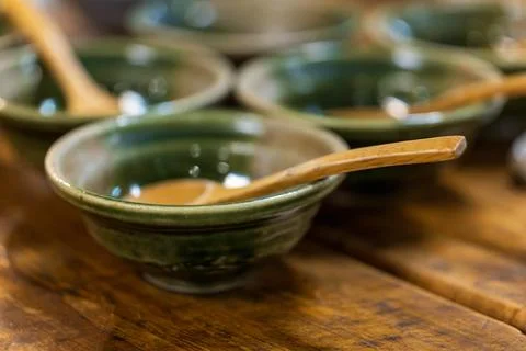 Close-up of traditional Hakka tea-drinking utensils in Miaoli: green cerami.. Фото