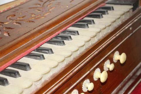 A close-up of a traditional harmonium. Stock Photos