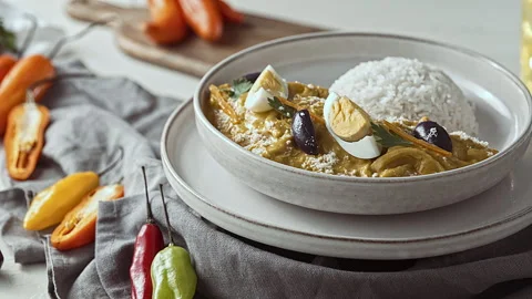 Close-Up of Traditional Peruvian Ají de Gallina with White Rice Stock-Footage 344980793