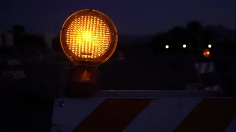 Close up of a traffic barricade at dusk Stock Footage 146146688