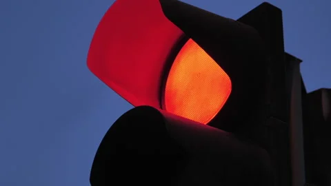 Close-up of a traffic light against the background of the evening sky. Red Stock Footage 141486206