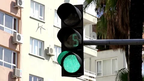 Close-up of a traffic light shifting from yellow to red in a city environment Stock Footage 256738279