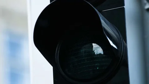 Close-up of traffic light turn green at the daytime. Picture of illuminated Stock Footage 69233058