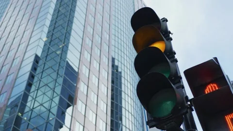 Close up traffic light with twilight city sky background. traffic control s.. Stock Footage 256737468