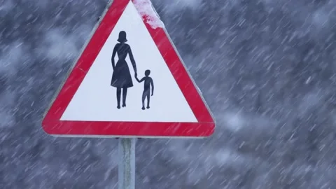 Close-up of a traffic sign in blizzard Stock Footage 148116477