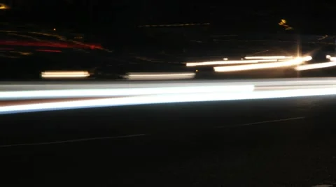 Close up of traffic speeding by. 库存影片 64709590