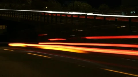 Close up of traffic speeding by ramp. 库存影片 64709407
