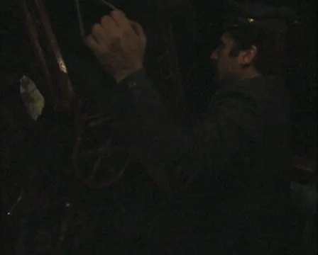 Close up of train driver at night Stock Footage