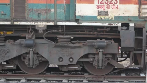 Close-Up of Train Engine Wheel on Railway Track in India Stock Footage 328653724