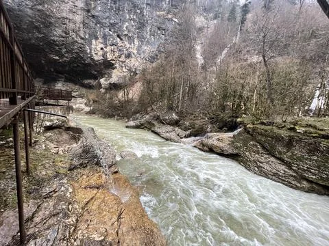 Close up of train going through mountainous terrain. Tourist train riding nea Stock Photos