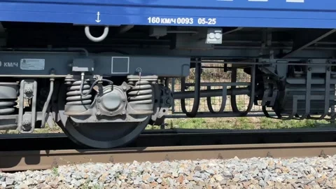 Close-up of train wheels moving on rails Stock Footage 315493779