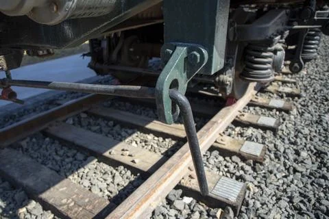 Close up of train wheels on railway tracks and wooden sleepers. Stock Photos