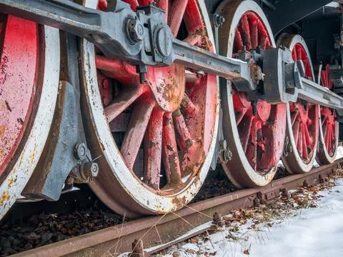 Close up with train wheels on track. Wheels of a train on the railway tracks. Foto stock