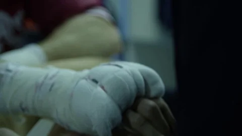Close up trainer wrapping hand of trainer. Close up sportsman holding hands of Stock Footage