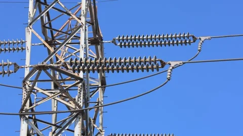 Close Up Transformer Tower Elements Against Blue Sky Stock Footage 315192727