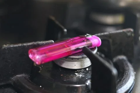 Close-up of a translucent purple disposable lighter Stock Photos