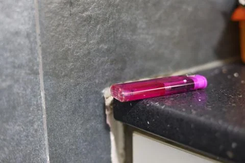 Close-up of a translucent purple disposable lighter Stock Photos
