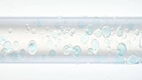 Close up transparent blue Air Bubbles, in Clear Water Rising up in Glass Test Stock Footage 276531707