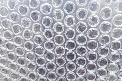 Close-up of transparent bubble wrap used for packaging and protection. Stock Photos