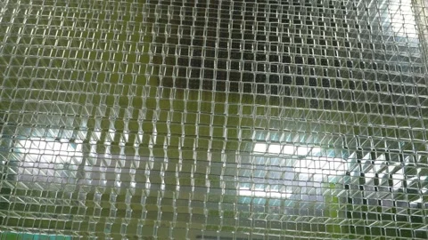 Close-up of Transparent Honeycomb Polycarbonate Sheet. Polycarbonate panel .. Video stock 330637896