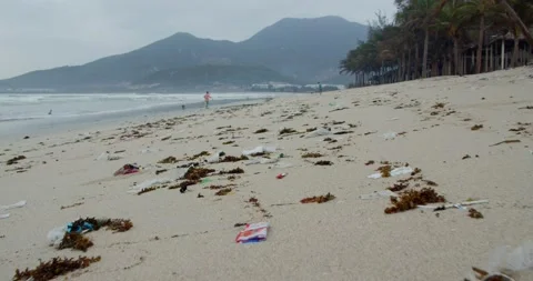 Close-up of trash, hundreds of plastic trash bags,sacks, trash cans strewn Stock Footage 148891271