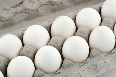 Close up of a tray with white eggs Foto stock