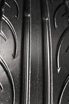 Close up of the tread surface of a used car tire Stock Photos