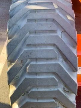 A close-up of the tread on a tire Stock Photos