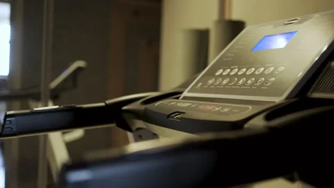 Close-up of Treadmill Control Panel with Safety Key. Detailed shot of a tre.. Video stock 332335140
