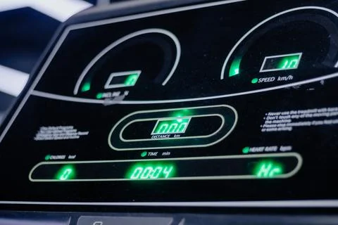 Close-up on Treadmill Display Screen Showing Workout Metrics Stock Photos