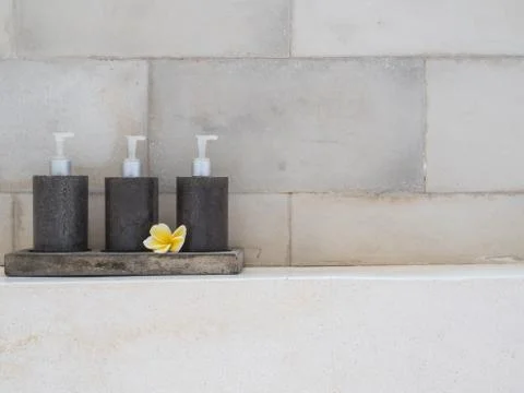 Close up of tree bottles in the bathroom Stock Photos