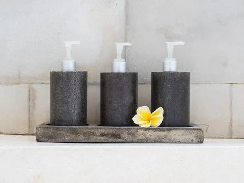 Close up of tree bottles in the bathroom Foto stock