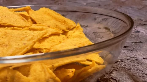 Close up. Triangle nachos corn chips in a glass plate. Best vegan nachos Video stock 120609729