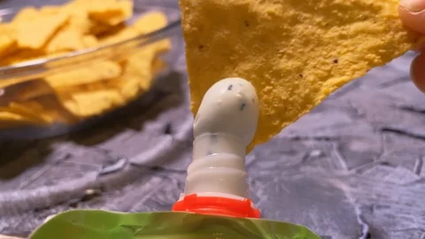 Close up. Triangle nachos corn chips in a glass plate. Best vegan nachos Video stock 120609788