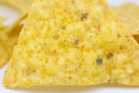 Close up, Triangular chips, mexican nachos, on white background. Perfect Ta.. 스톡 사진