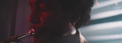 Close up of a trumpeter playing in backlit Stock Footage 202318990