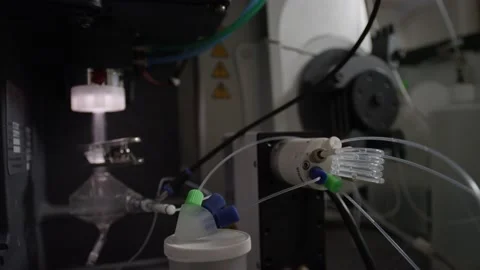 Close up of tubes and wires on mass spectrometer machine Stock Footage