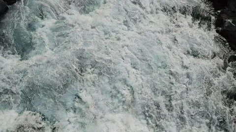 Close-Up of a Turbulent Waterfall, A close-up view of a turbulent waterfall, Stock Footage 283021883