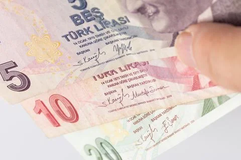 Close-up of Turkish banknotes in a hand. Stock Photos