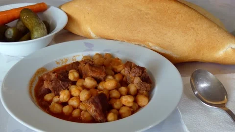 Close-up turkish cuisine hot chickpea dish with meat, Stock Footage 166403376