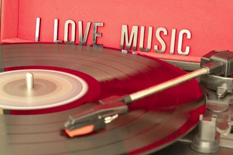 Close up to a turn table needle playing a LP vinyl disc with turn table Foto stock